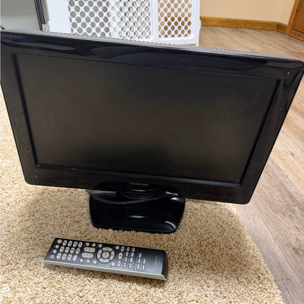 Toshiba Black TV with Remote Control